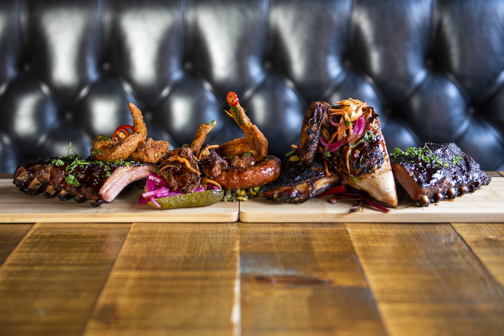 Full Bear Bones BBQ spread — ribs, wings and burnt ends